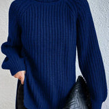 Turtleneck sweater for women with raglan sleeves and split hem