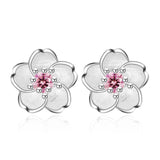 Flower-shaped button earrings with zirconia