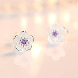 Flower-shaped button earrings with zirconia
