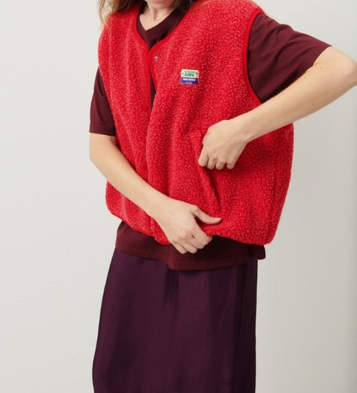 Buttoned sleeveless vest in lambswool for women – Soft, comfortable, and versatile